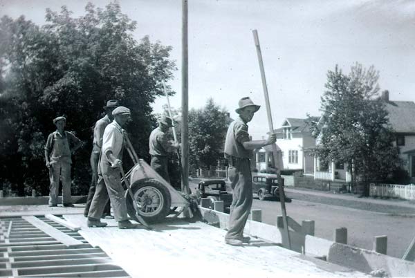 1947 cement foundation Sid Visser far left foreman for Steward Olsen church builders